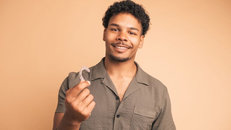 adult holding their lost invisalign tray
